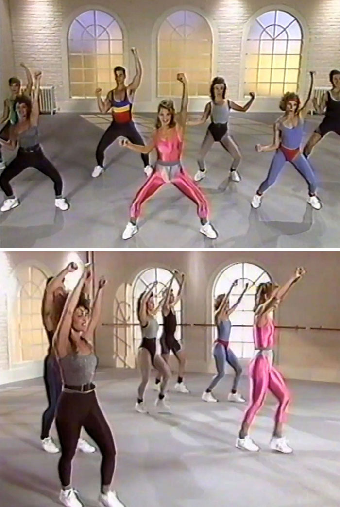 Group exercising in an 80s gym, wearing colorful leotards and leg warmers, practicing aerobic fitness moves.