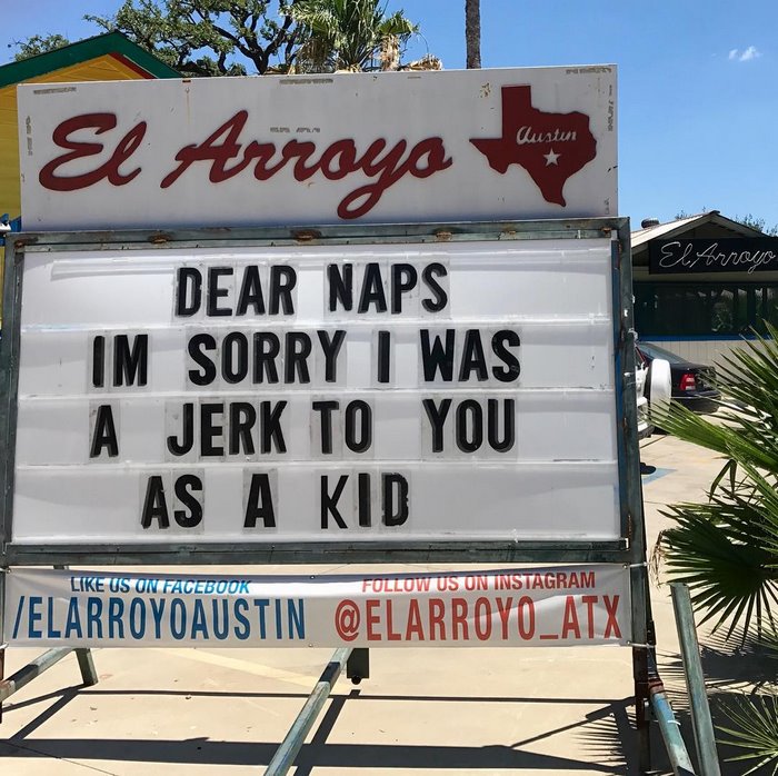 El Arroyo sign reads, "Dear Naps, I'm sorry I was a jerk to you as a kid," humorously lamenting past decisions.