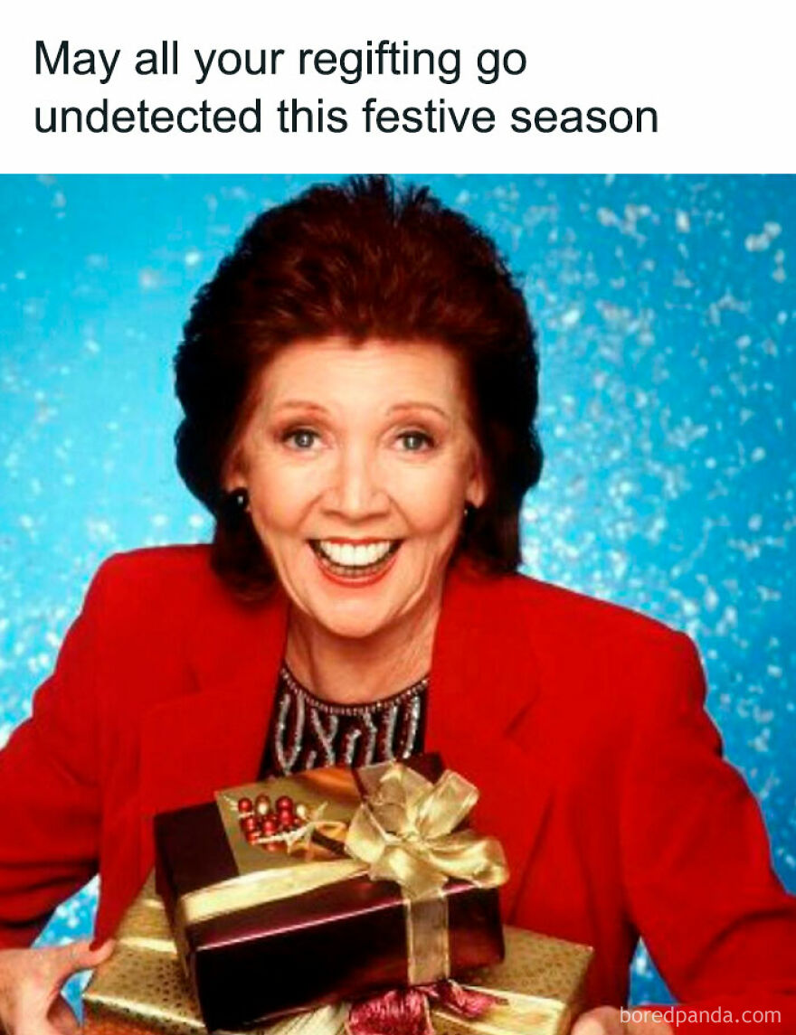 Smiling woman in a red blazer holding gifts, with text about regifting for a funny Christmas meme.