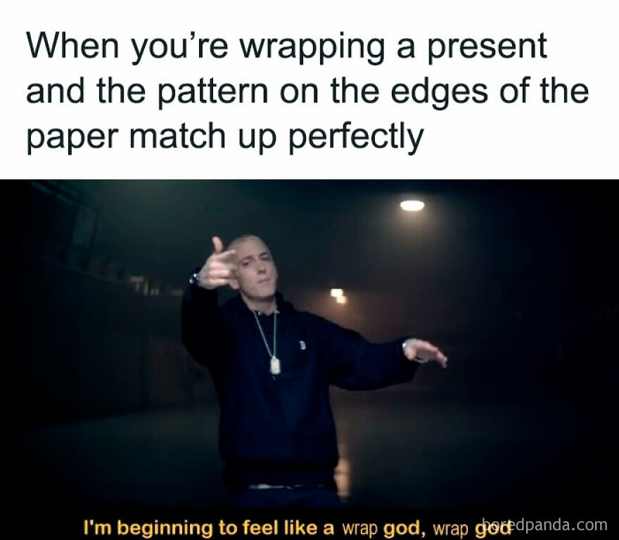 Man striking a pose in a dark room with funny Christmas meme text about perfectly wrapping presents.