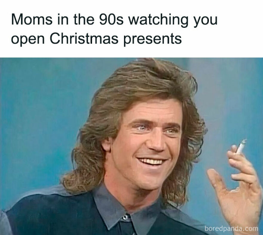 1990s mom with a mullet hairstyle holding a cigarette, smiling humorously about Christmas.