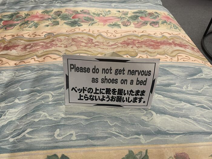 Sign on a bed in Japan humorously mistranslated: "Please do not get nervous as shoes on a bed."