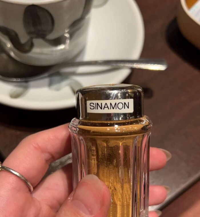 Spice jar labeled "SINAMON," illustrating translation error in Japan.