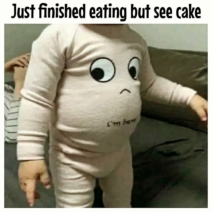 Child in a snug onesie with eyes, embodying dieting frustrations humor.