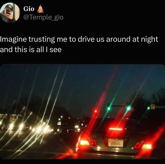 Blurry night driving view with lights and humorous text expressing vision difficulties, reflecting funny memes theme.