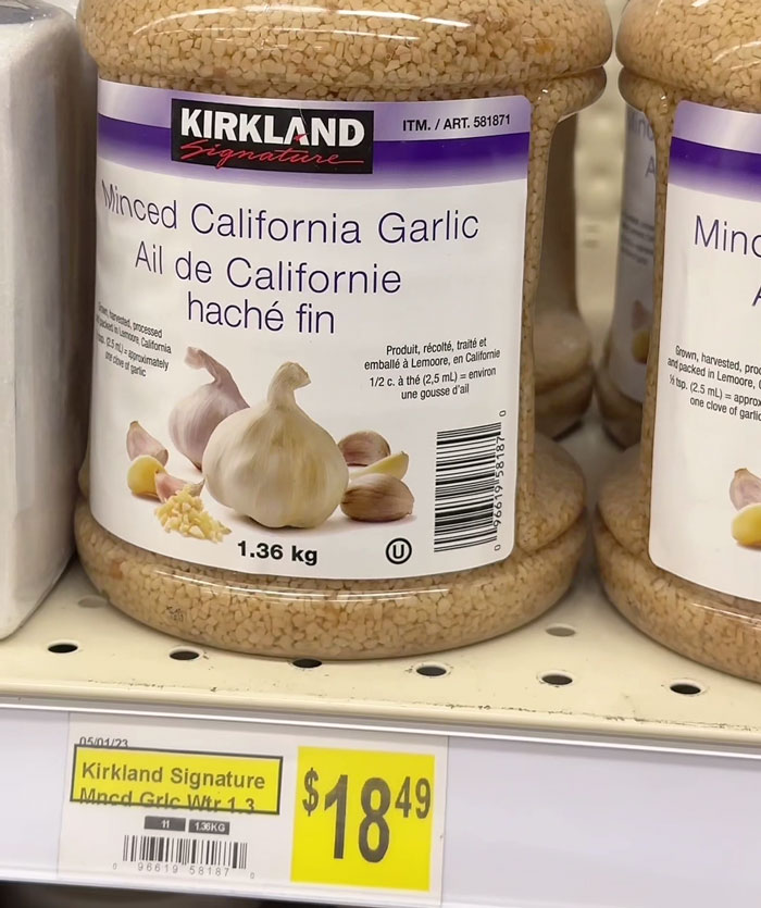 Minced garlic jar with $18.49 price tag, highlighting high Arctic grocery costs.