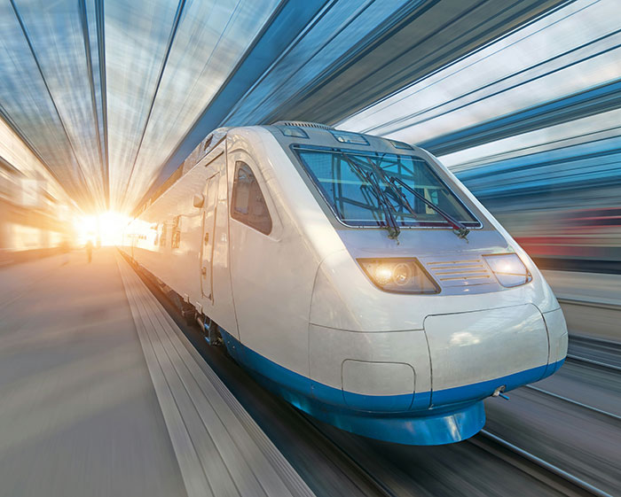 High-speed train traveling through a futuristic tunnel, symbolizing rapid London to New York travel.