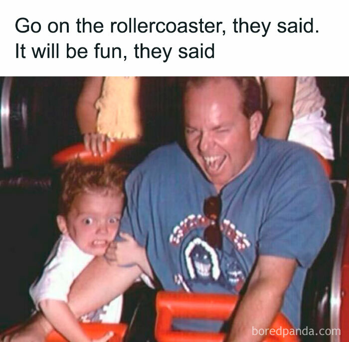 Father and son on a rollercoaster ride, displaying funny facial expressions in a classic fail moment.