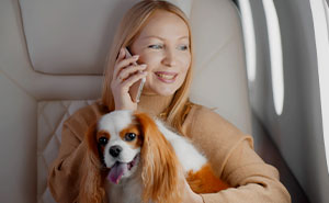 Tall Woman Nearly Has Her Spacious Seat Nabbed By Passenger With Dog, Puts Her Foot Down