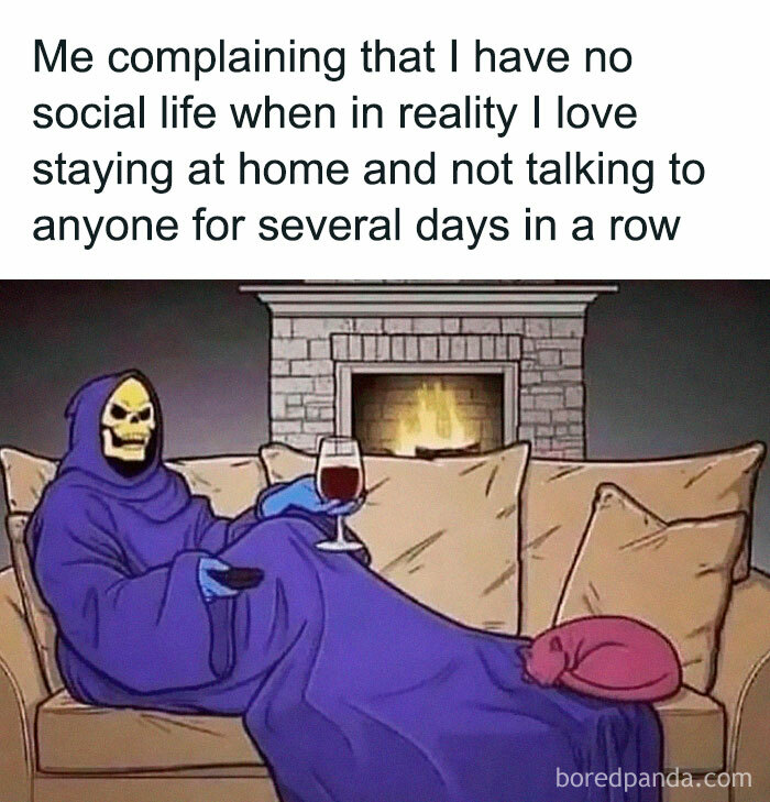 Skeletor in a robe, lounging on a couch, holding a wine glass, humorously depicting staying sane at home.