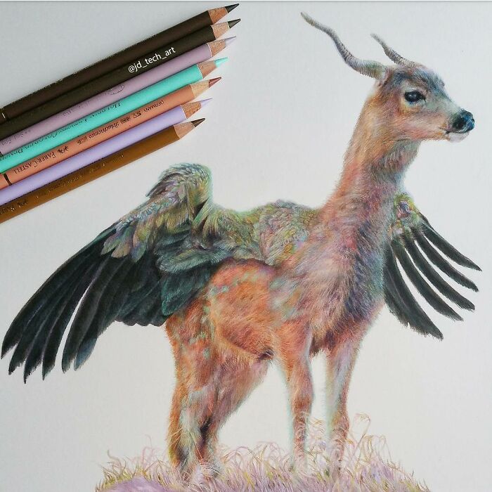 Hyper-realistic pencil drawing of a fantastical creature with wings and antlers surrounded by colored pencils.