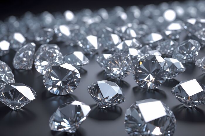 Shiny diamonds scattered on a dark surface, representing industries built on fooling people.