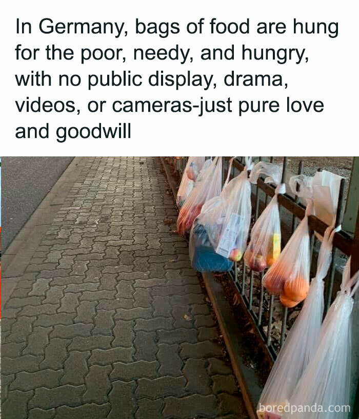 Bags of food hanging on a fence in Germany for the needy, showcasing goodwill and relief from holiday stress.