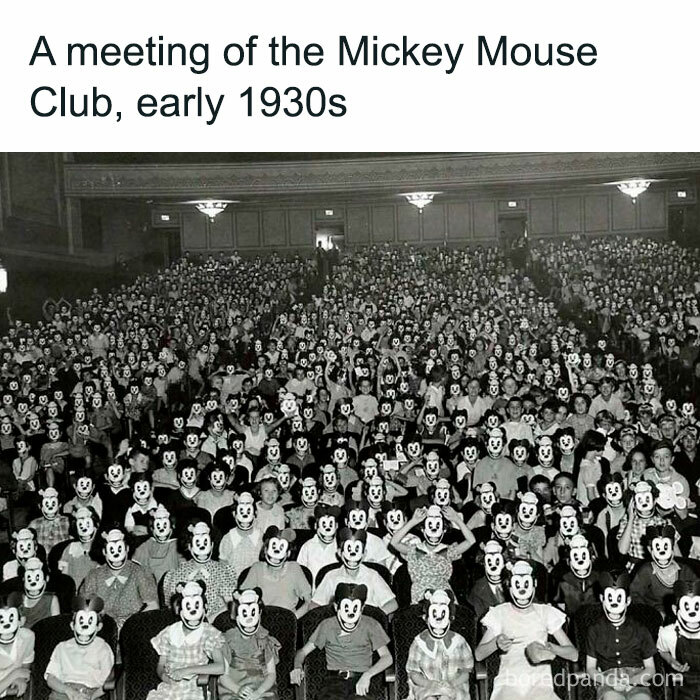 1930s Mickey Mouse Club meeting, showcasing interesting history pics and unique facts in a crowded theater.