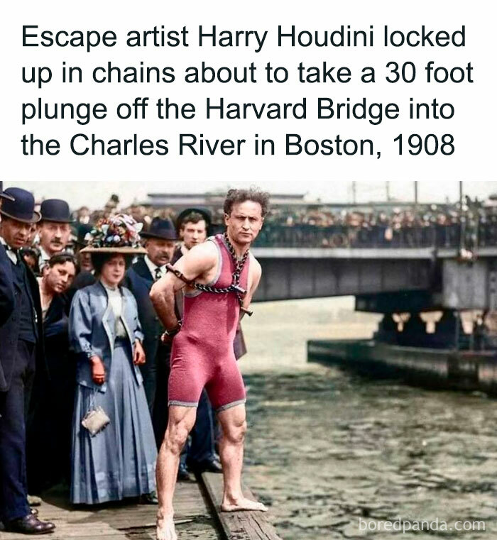 Historic image of Harry Houdini in chains, preparing for a stunt jump off Harvard Bridge into the Charles River, Boston, 1908.