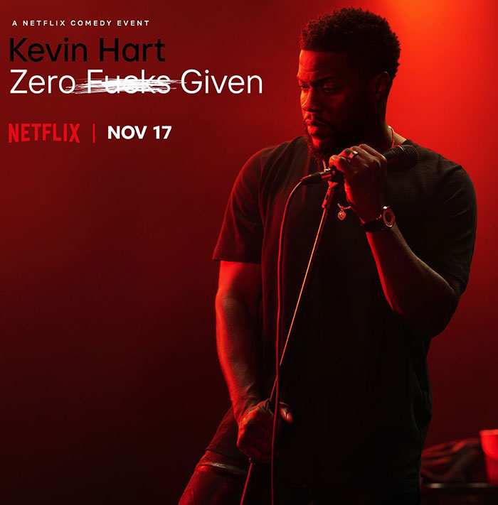 Kevin Hart performs on stage under red lighting in the Netflix special "Zero F**ks Given," with promotional text and a release date of Nov 17.