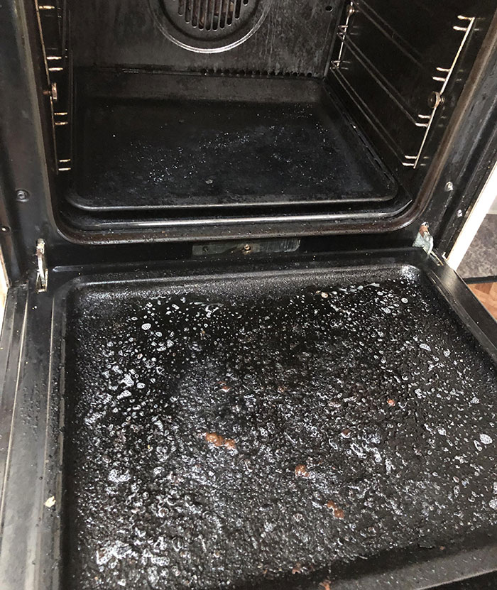 Dirty oven covered in grease and grime, illustrating lazy-infuriating-people maintenance issues.