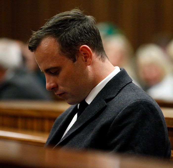 Paralympian athlete Oscar Pistorius, accused of taking life of his girlfriend Reeva Steenkamp three years ago, looks on during a hearing in his trial on July 6, 2016 at the High Court in Pretoria, South Africa