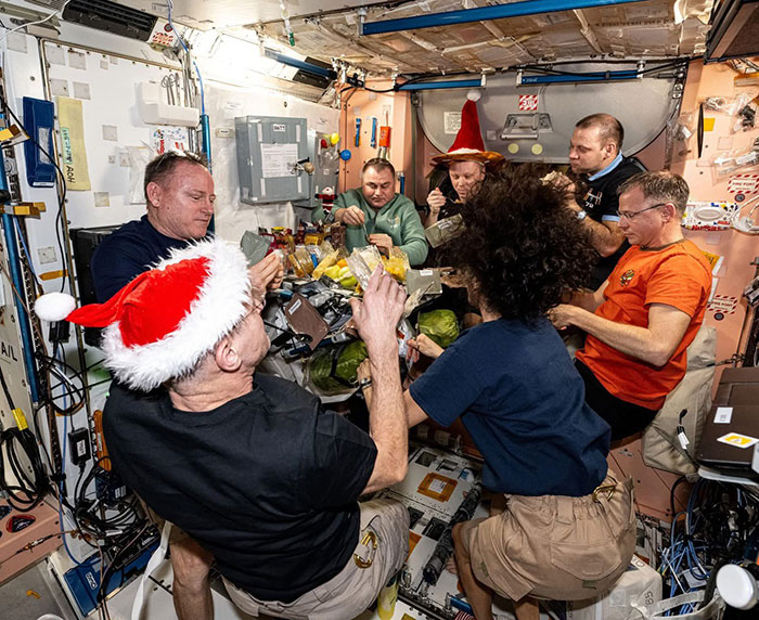 Festive Photo Of Stranded Astronauts Sparks Conspiracy Theories: “Something Fishy Is Going On”