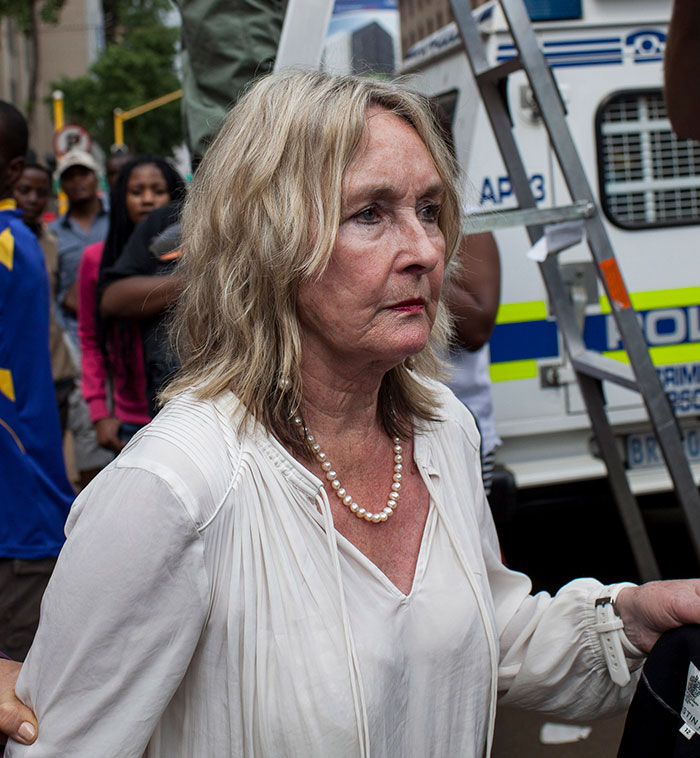 Mother of Reeva, June Steenkamp leaves North Gauteng High Court following the third day of sentencing on October 15, 2014 in Pretoria, South Africa