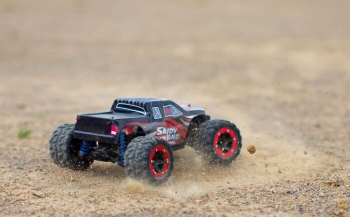 Remote control truck on dirt, representing a retirement gift.