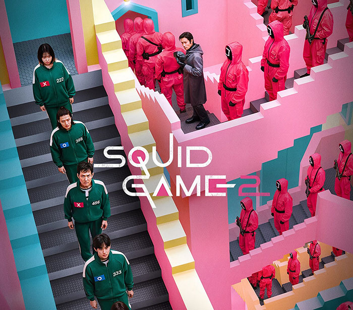 "Squid Game 2 promotional poster with characters in colorful, geometric setting.