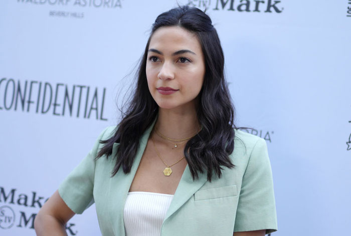 Actress from Tell Me Lies Season 2, wearing a mint blazer at a promotional event.