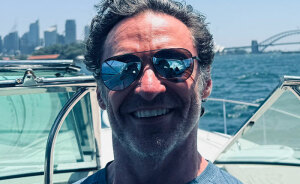 “Very Stalkerish”: Mystery Woman Reflected In Hugh Jackman’s Sunglasses Triggers Speculation