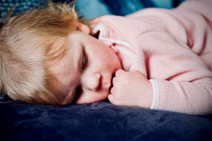 Newborn baby in an incubator, highlighting insurance claims issues with UnitedHealthcare.