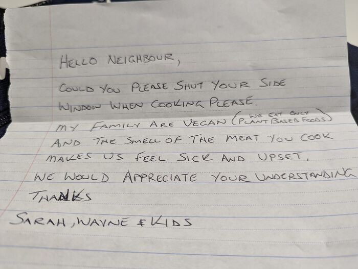 Handwritten note from vegan family requesting neighbors to close windows while cooking meat due to smell.