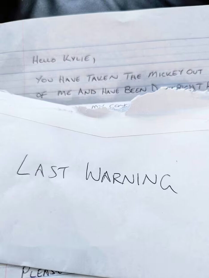 Handwritten letter with "Last Warning" envelope linked to vegan family and neighbor dispute over cooking meat.