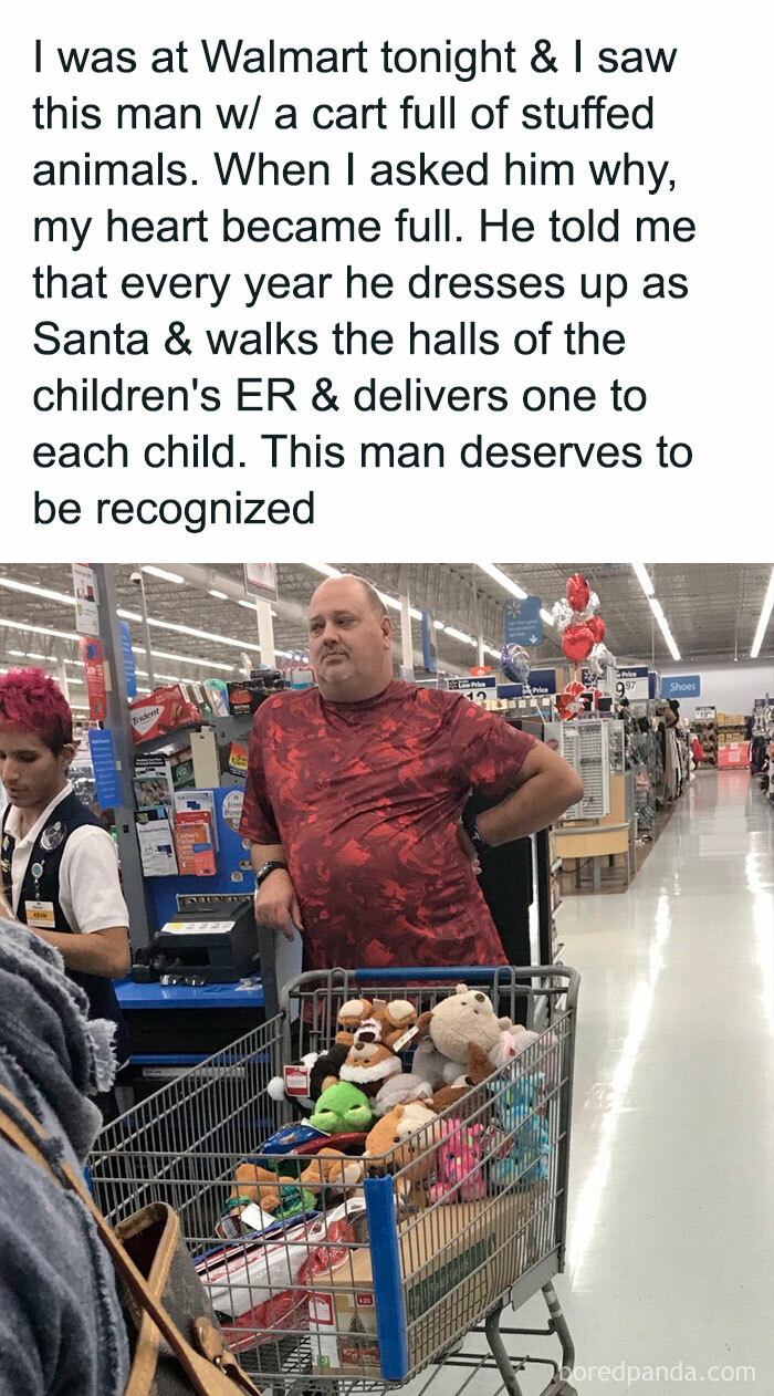 Man in a store with a cart full of stuffed animals, showcasing wholesome-kindness, preparing gifts for children's hospital visit.