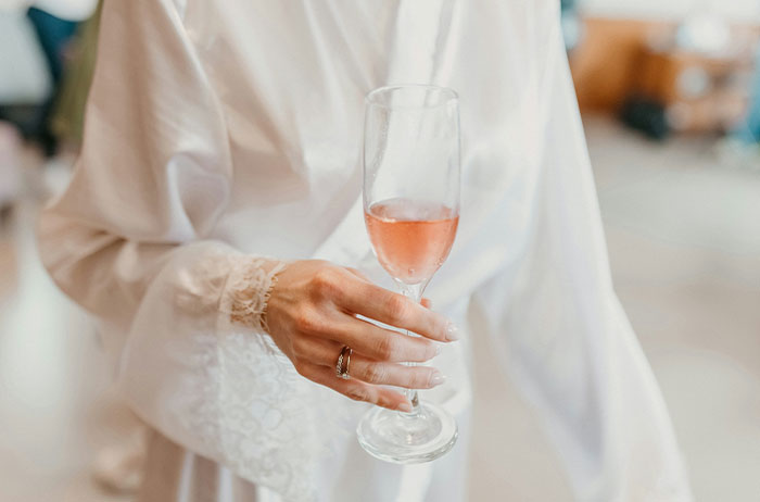 Woman Confused Why Brother Is Angry She Wore A White Blouse Under Her Black Suit To His Wedding