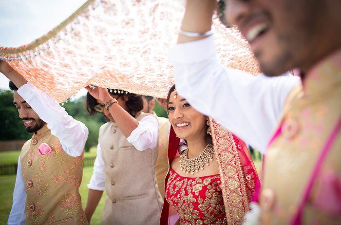 Woman Confused Why Brother Is Angry She Wore A White Blouse Under Her Black Suit To His Wedding