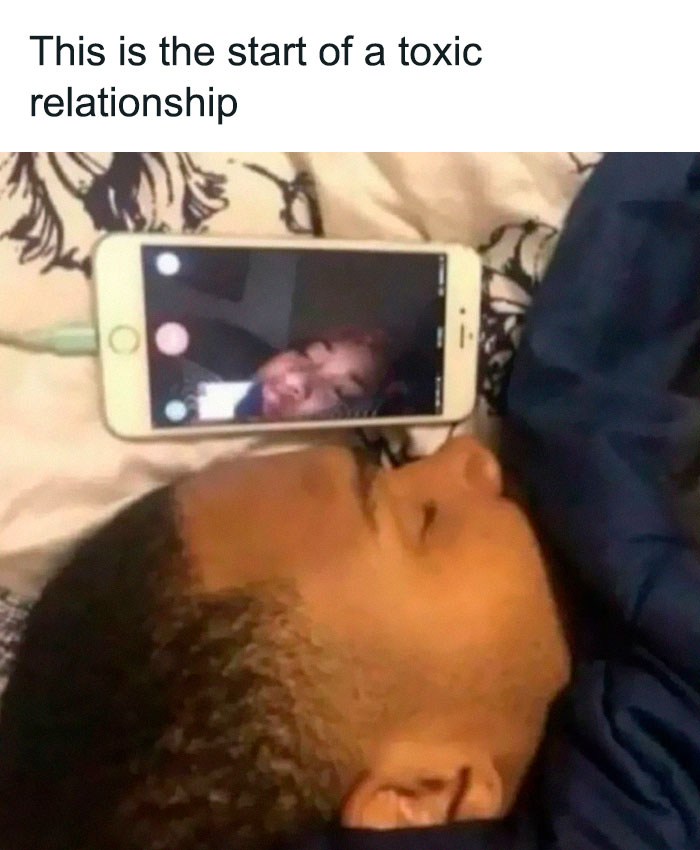 Man asleep with phone on his face, video call image, showcasing a humorous fail.