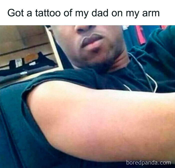 Man showing off a tattoo fail, intended as a tribute to his dad.