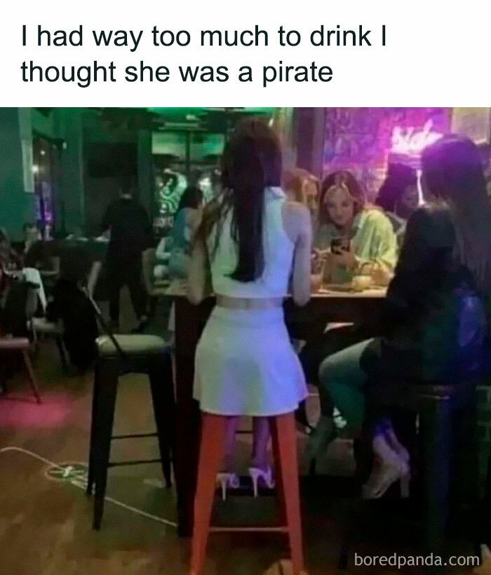 A woman sits on a stool, creating an optical illusion resembling pirate legs. Worst-Funny-Fails moment at a bar.