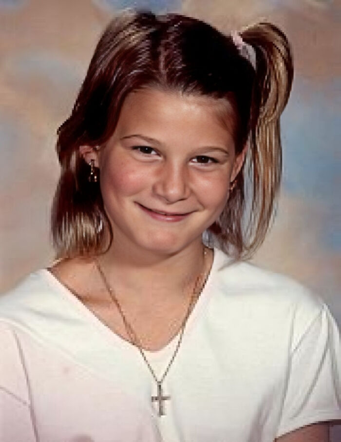 Young girl in a white shirt with a cross necklace, related to true crime stories and curiosities.