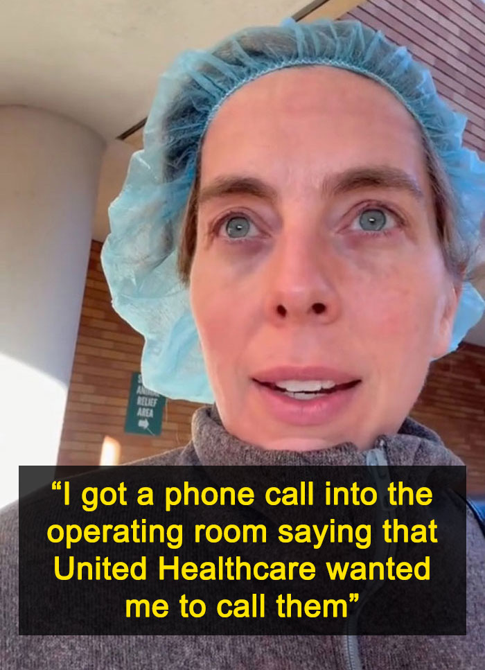 Doctor in scrubs filming a video message about an insurance call during surgery.