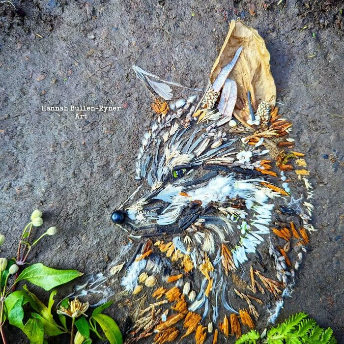 Animal portrait in earth art style, crafted with natural materials like leaves and stones, depicting a fox.