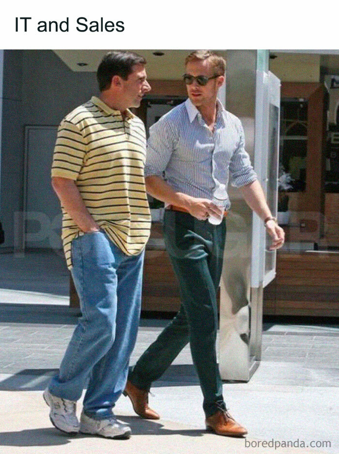 Two men walking, one in casual attire, one in business attire, captioned "IT and Sales," representing funny office dynamics.