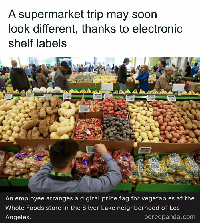 Supermarket employee adjusts digital shelf labels for vegetables, suggesting a boring dystopia retail experience.