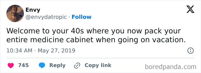 Tweet about packing a medicine cabinet for vacation in your 40s, capturing the essence of being in your 40s.