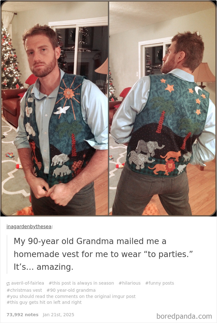 Man wearing a colorful homemade vest with animal designs, posing in front of a Christmas tree, showcasing a random hilarious meme.