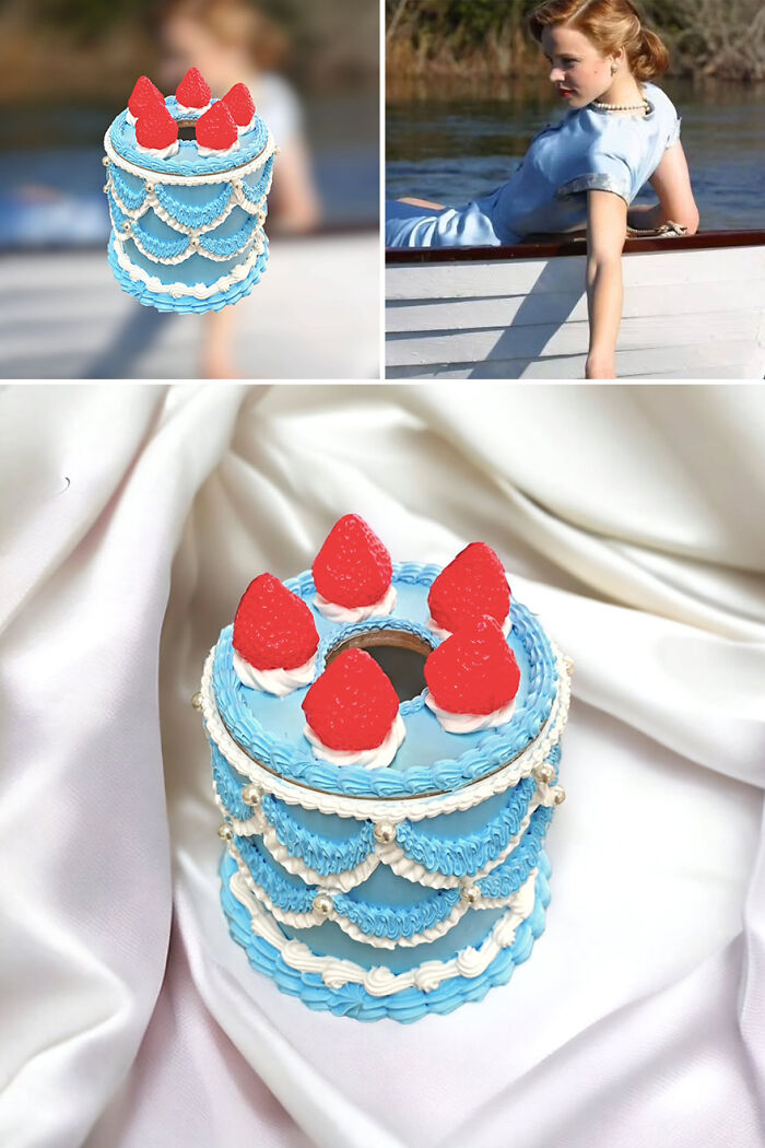 Cake-inspired storage box designed by an artist, decorated with raspberries and blue icing, influenced by movies and series.