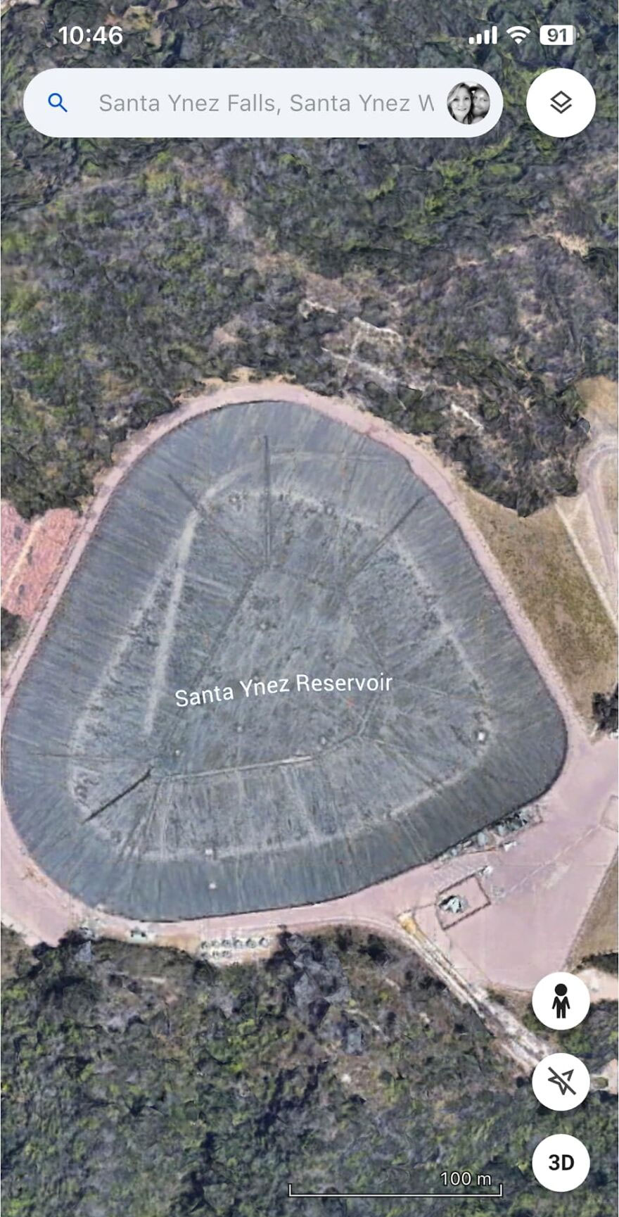 Google Earth image of Santa Ynez Reservoir's unique triangular shape surrounded by greenery.