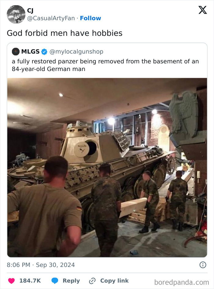 Men removing a restored Panzer tank from a basement, humorously illustrating history topics through memes.