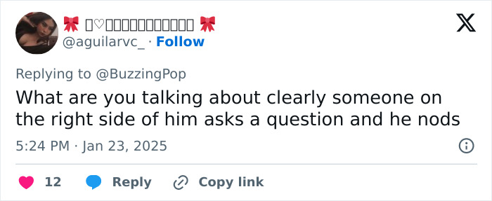 Tweet response questioning a person's comment about an event, mentioning nodding in agreement.