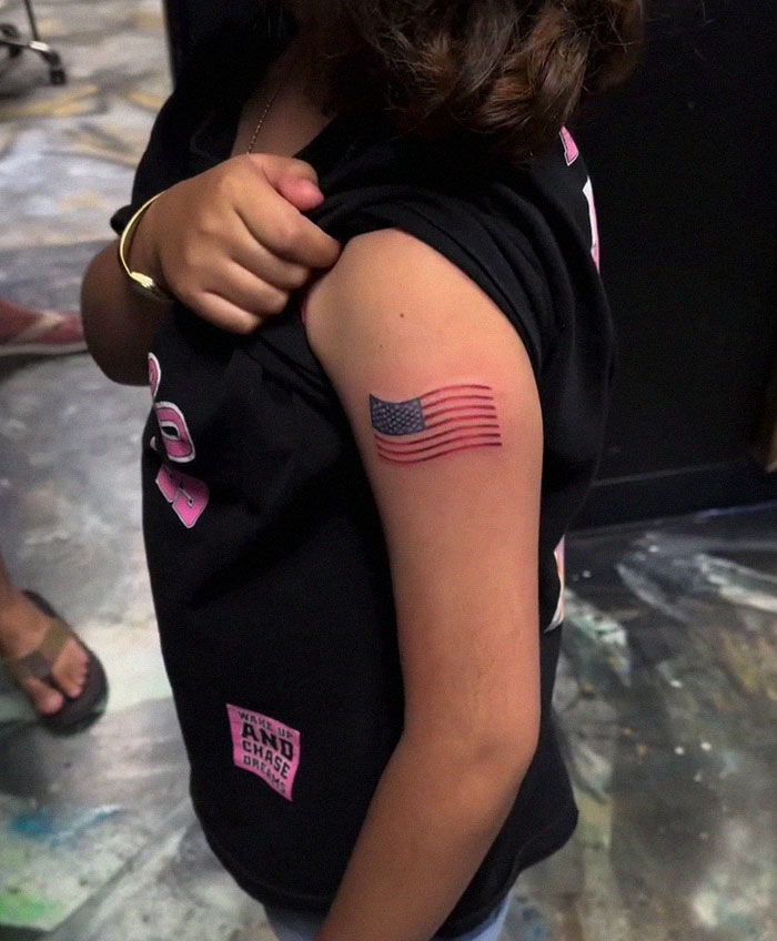 “Shame”: 9-Year-Old Girl Walks Out With American Flag Tattoo, Artist Faces Backlash