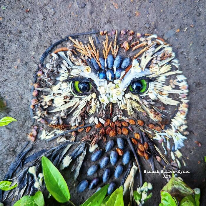 Animal portrait of an owl made from natural materials, showcasing detailed earth art.